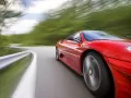 обои для рабочего стола: «Ferrari 430 Scuderia летит по дороге»
