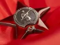 обои для рабочего стола: «Орден Красной Звезды на красной материи»