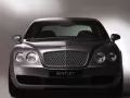 обои для рабочего стола: «Чёрный Bentley Continental-Flying-Spur вид спереди»