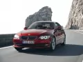 обои для рабочего стола: «BMW 3-Series Coupe на горной дороге»