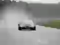 Bugatti Veyron-Targa starts with a smoke from under wheels