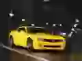 Replej of Chevrolet Camaro rushes on a night city