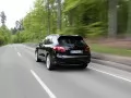 current picture: «Black Porsche Cayenne rushes on road»
