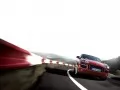 выбранное изображение: «Porsche Cayenne GTS летит по дороге»