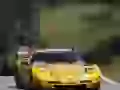 Yellow Chevrolet Corvette in front