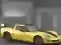 Yellow Chevrolet Corvette on a grey background