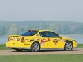 выбранное изображение: «Жёлтый Chevrolet на фоне озера»
