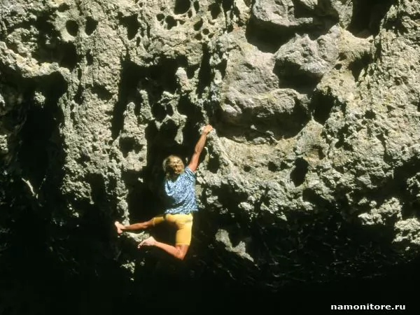 Climber over a precipice, Rock-climbing