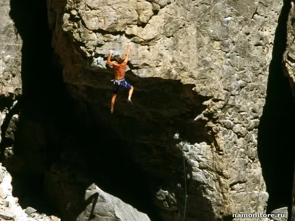 On a rock over a precipice, Rock-climbing