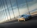 выбранное изображение: «Aston Martin DB9 несётся по мосту»