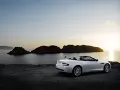 обои для рабочего стола: «Aston Martin DB9 Volante на берегу моря»