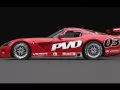 open picture: «Red Dodge Viper-Competition-Coupe on a black background, sideways»