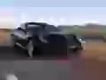 Black Ferrari 599 GTB rushes on highway