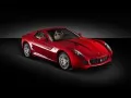 обои для рабочего стола: «Красная Ferrari – 599 GTB Fiorano на чёрном фоне»