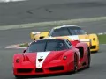 обои для рабочего стола: «Ferrari FXX Racing. Два гоночных автомобиля на трассе»