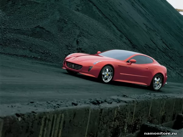 Красная Ferrari на фоне чёрный скал, Ferrari
