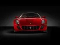 open picture: «Red Ferrari – 599 GTB Fiorano on a black background, the front view»