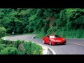 обои для рабочего стола: «Красный Ferrari F430 на дороге через зелёный лес»