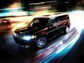 open picture: «Ford Flex flies on a night city»