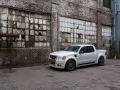 open picture: «Ford Explorer at a factory wall»