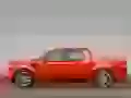 Red pickup Ford a side view