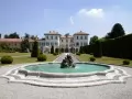 Fountain before a country estate