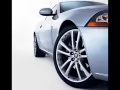 выбранное изображение: «Jaguar Xk, снимок от переднего колеса вдоль кузова»