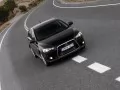 обои для рабочего стола: «Чёрная Mitsubishi Lancer Sportback мчится по дороге»