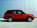 Red Land Rover Range Rover port a side view