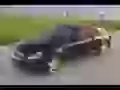 Black Lexus a cabriolet on road