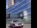 current picture: «Silvery Maybach 57-S rushes lengthways a dark blue glass wall»