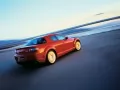 выбранное изображение: «Красная Mazda Rx-8 на берегу моря»