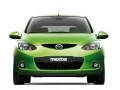 обои для рабочего стола: «Зелёная Mazda 2 спереди»