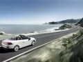open picture: «Renault Megane Coupe-Cabriolet rushes along the sea»