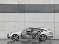 open picture: «Mercedes-Benz Concept Shooting Break at a grey wall»