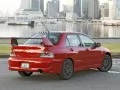 обои для рабочего стола: «Красный Mitsubishi Lancer-Evolution-Mr у морского залива»