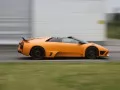 обои для рабочего стола: «Lamborghini Murcielago Spyder IMSA летит по дороге»