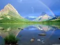 open picture: «Lake, a dark blue smooth surface and a rainbow»