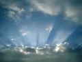 open picture: «Solar beams in clouds»