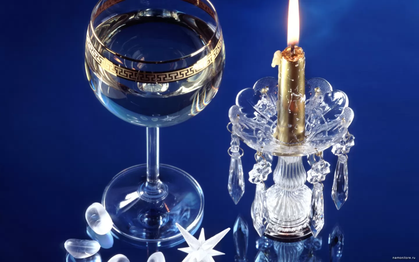 Glass and a candle, dark blue, drinks, holidays, New year, still-life x