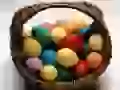 Basket with multi-coloured eggs by Easter