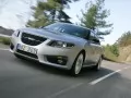 open picture: «Saab 9-5 Sedan rushes on road»