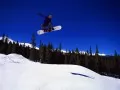 The Snowboard. A jump