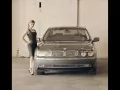 Strut Bmw-7-Series and the girl in a black dress