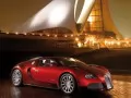 обои для рабочего стола: «Красный Bugatti Veyron у отеля»
