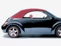 обои для рабочего стола: «Чёрный Volkswagen New-Beetle сбоку»