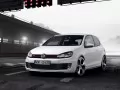 open picture: «Volkswagen Golf GTI Concept on a racing line»
