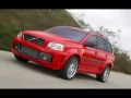 выбранное изображение: «Красная Volvo Xc90-Puv на дороге»