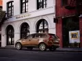 open picture: Volvo XC60 in the street cities