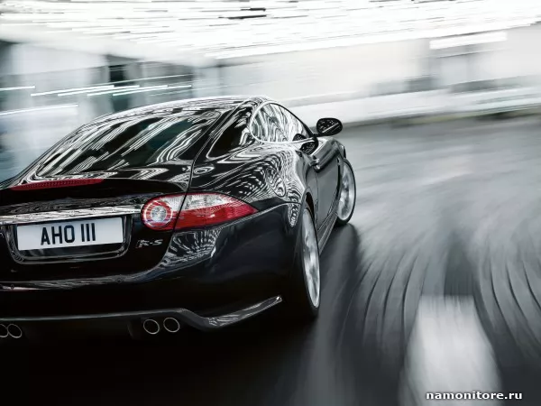Jaguar XKR-S rushes on road, XKR